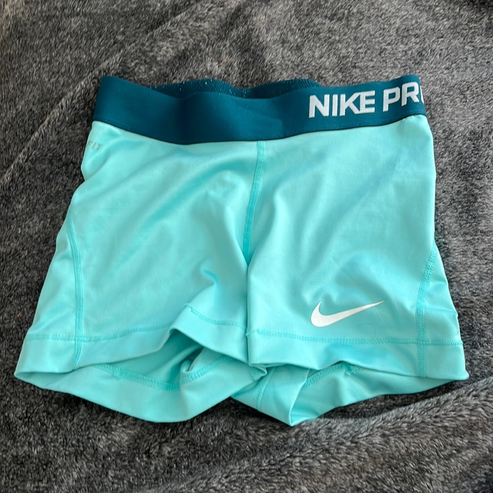 Teal/Light blue Nike Pros, Size Womens XS